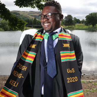 student celebrating graduation