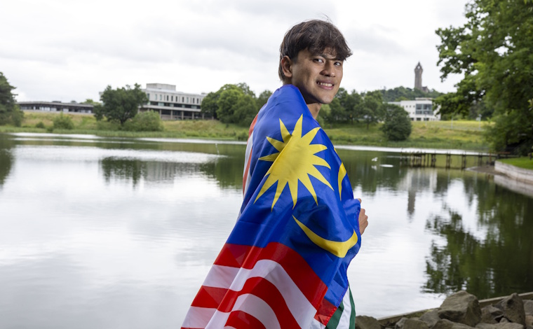 Arvin Shaun Singh Chahal with Malaysian flag.