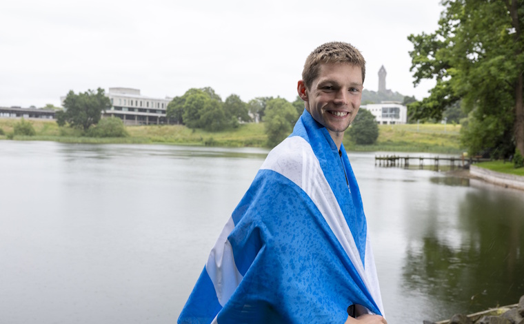 Duncan Scott with Scottish flag.