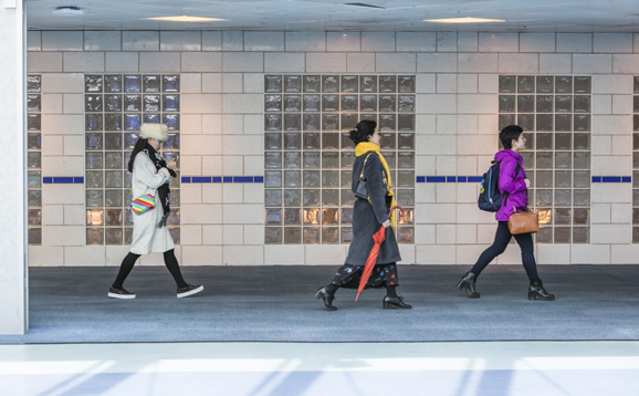 students walking in atrium