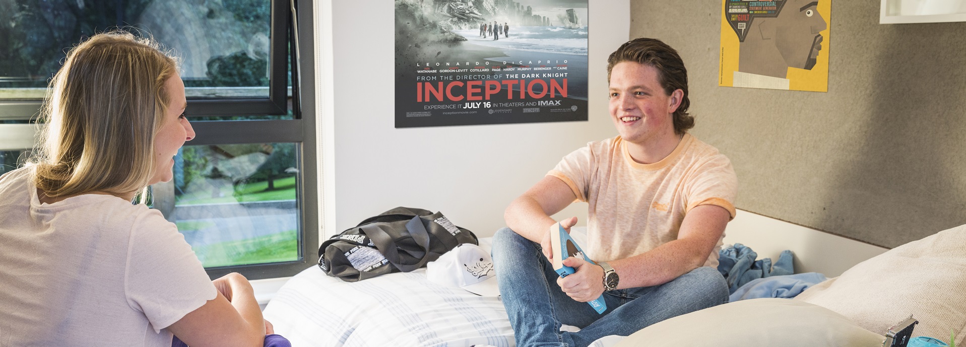 Students talking in a room in the university accommodation