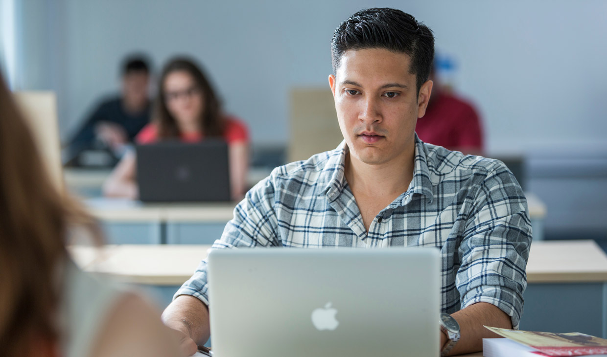 student-looking-at-computer-1240x730 copy