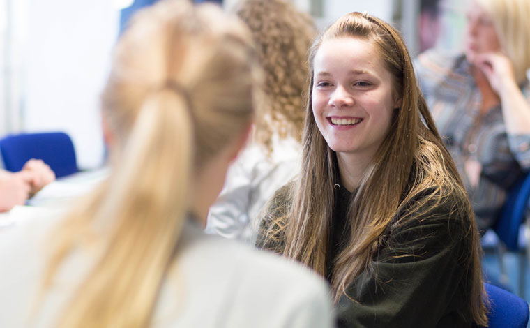 A prospective student talking at a University of Stirling open day