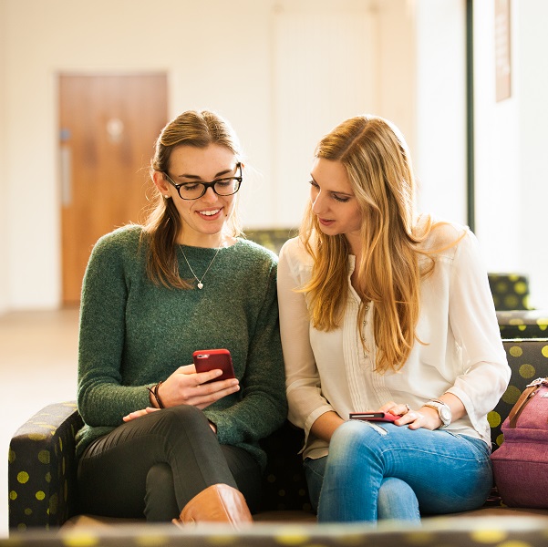 Students looking at their mobile phone