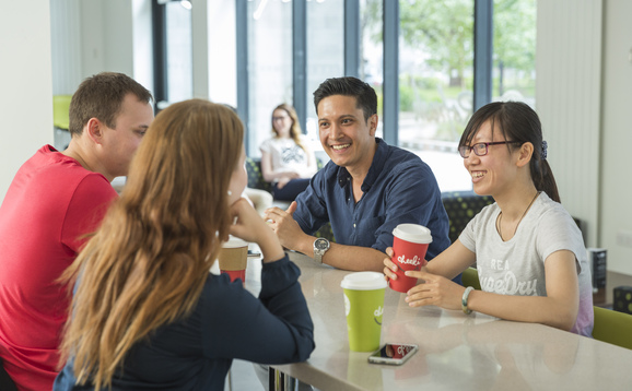 Students chatting and drinking coffee