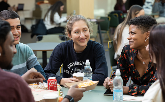 Students eating food at Scran