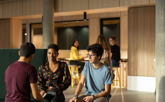 Group of students sitting in Campus Central