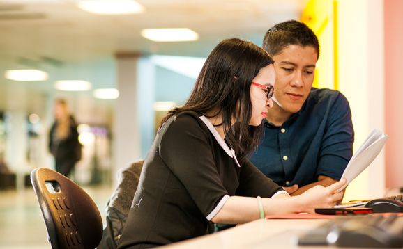 Two students at a computer