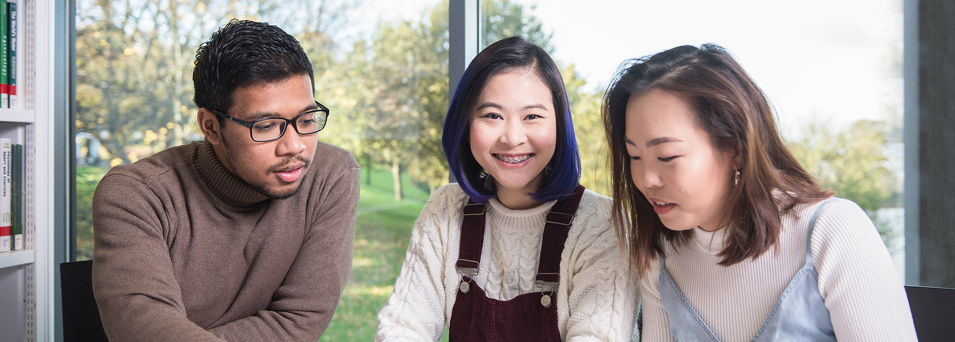 International student group sat in library