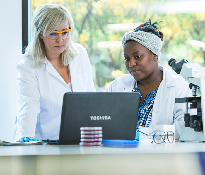 researchers in lab