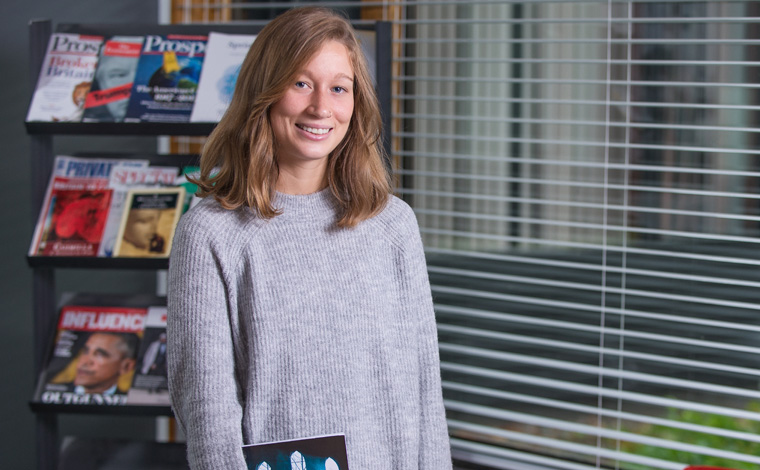 student with book