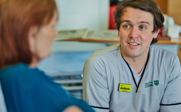 nurse talking to patient