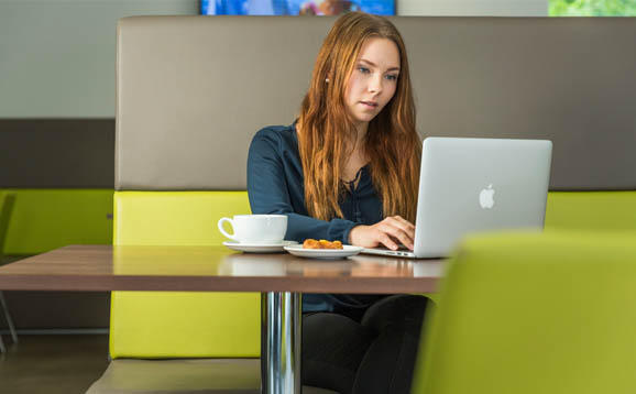 student working on laptop