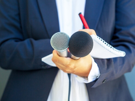 person holding microphone