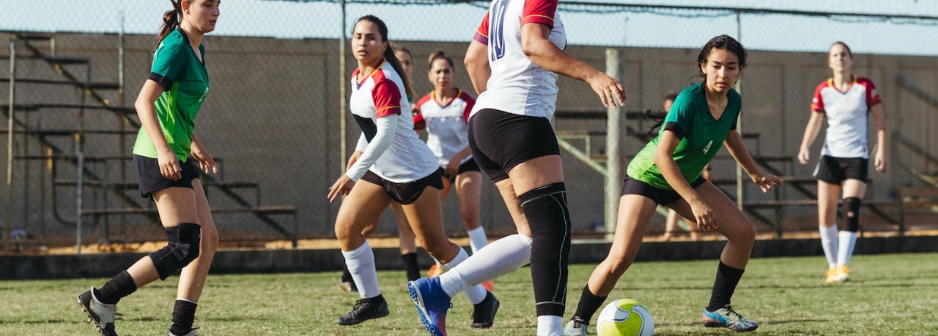 women playing football