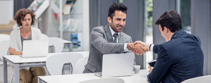 two men shaking hands