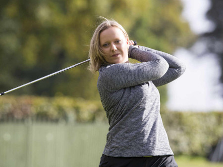 Chloe Goadby playing golf