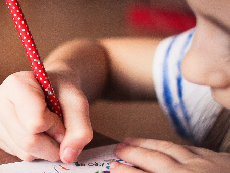 An image of a child drawing