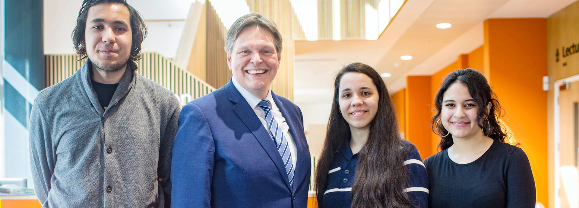 An image of MP Stephen Kerr with students