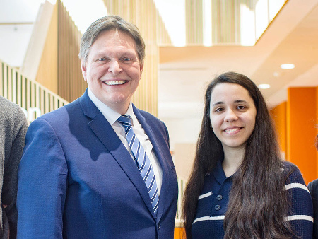 An image of MP Stephen Kerr with a student