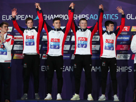 Duncan Scott celebrates with GB teammates on podium