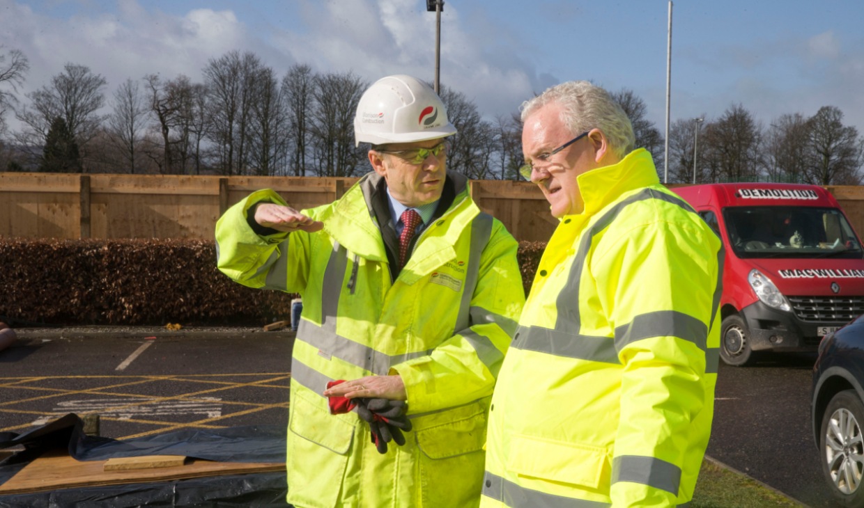 Graeme Lang and Professor Gerry McCormac discussing the sports facilities redevelopment