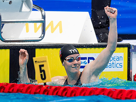 Kathleen Dawson celebrating in pool