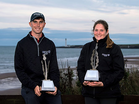 Stirling golfers George Cannon and Lorna McClymont pose for a photo with their trophies