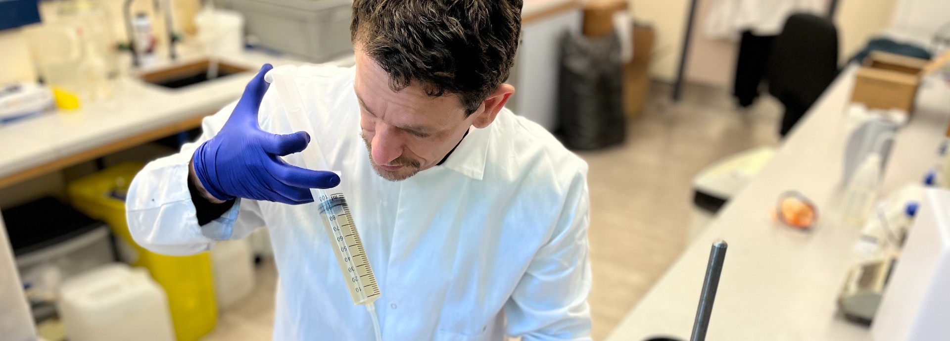 Dr Xavier Alexis Walter, a senior researcher in water and wastewater management in a circular economy at The James Hutton Institute in Aberdeen, feeding his experiment.