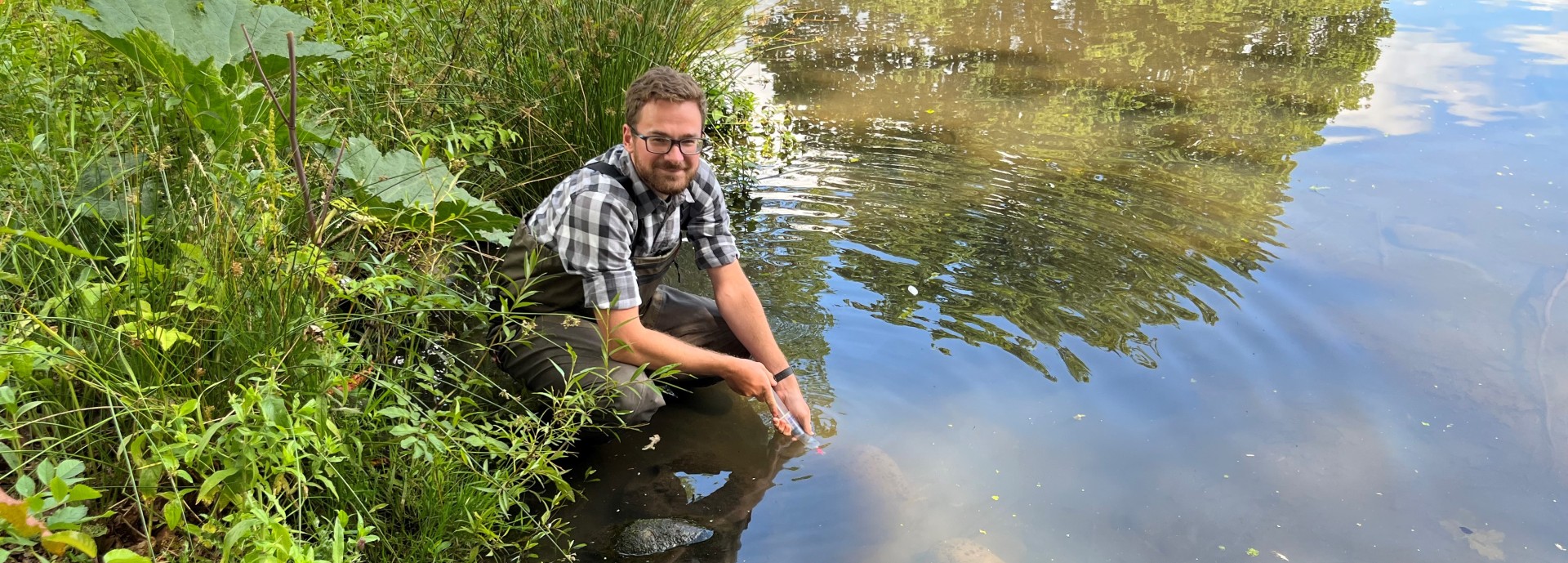 Dr Alan Law using sampling kit at the University of Stirling campus