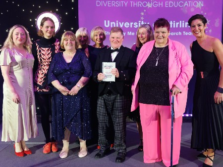 The Stand by Me team on stage at the award ceremony