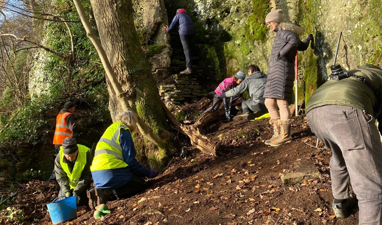 People exploring wood