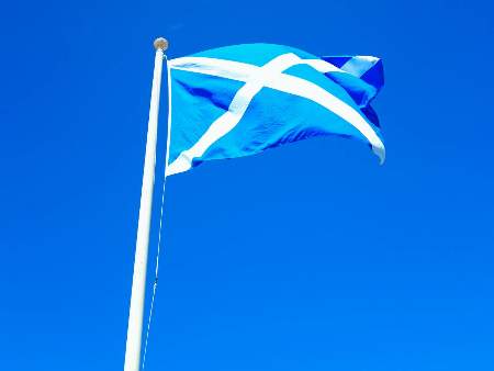 Scotland flag with blue sky