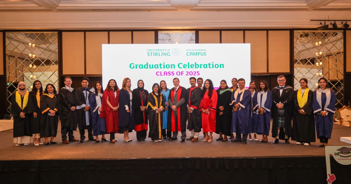 Staff on the stage at the University of Stirling's graduation in the UAE