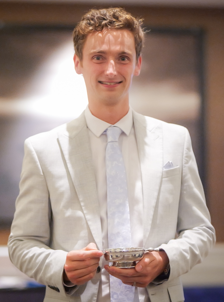 Scott MacAulay with his award.