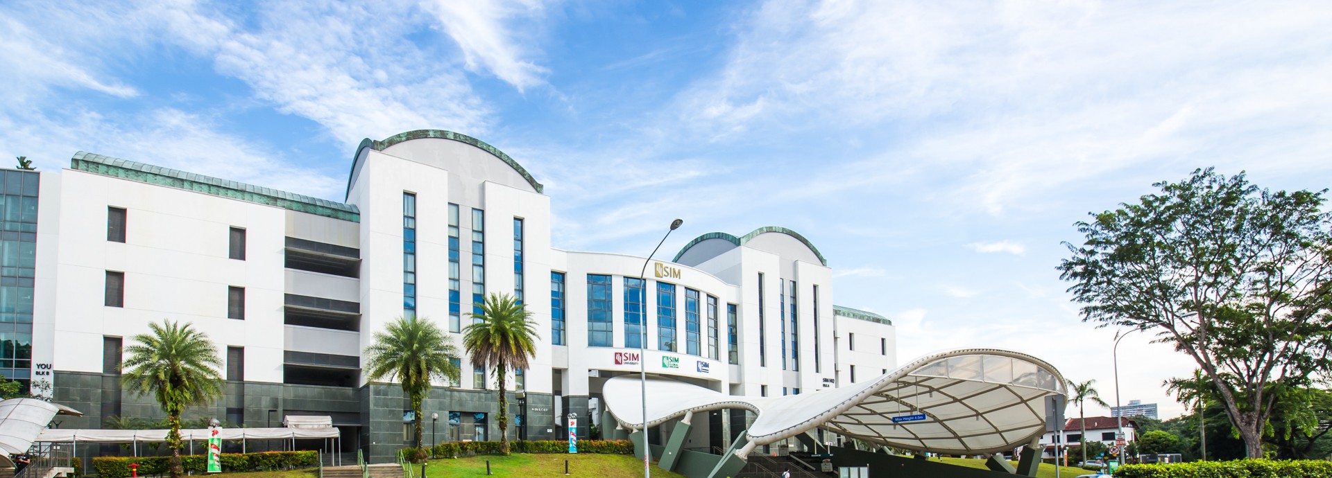 The exterior of the SIM GE campus building