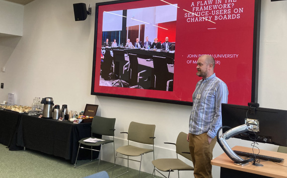 arts and humanities conference attendee presenting