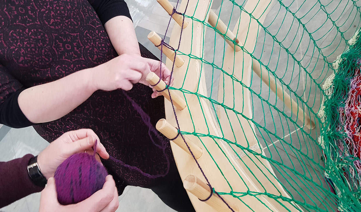 Community working on a basket