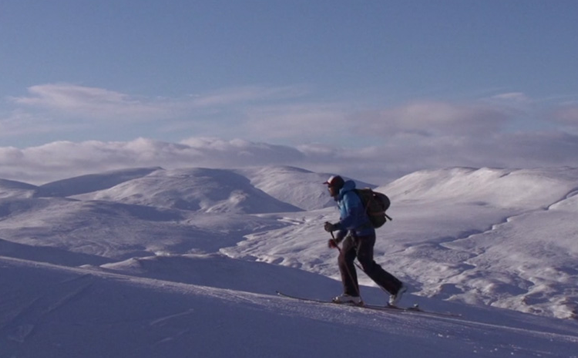 person walking in the mountains