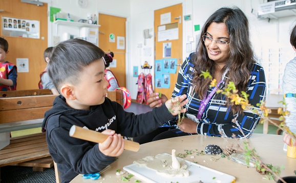 Staff member and child at Psychology Kindergarten