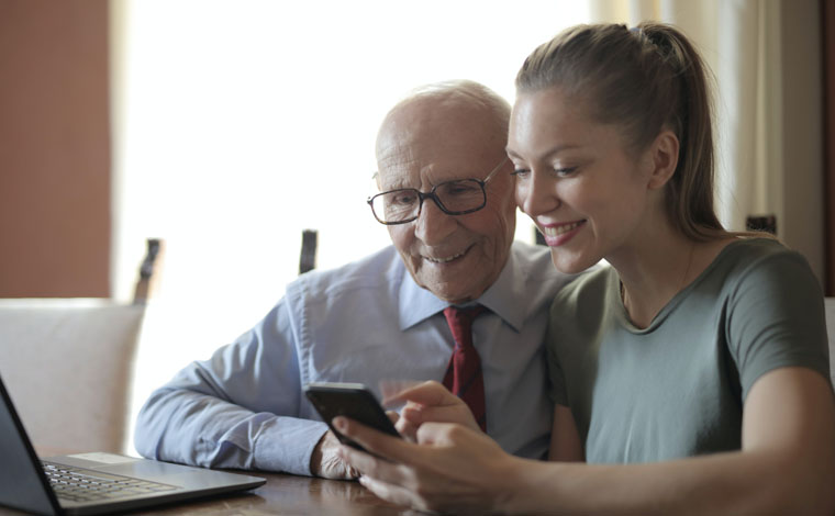 two people looking at phone screen