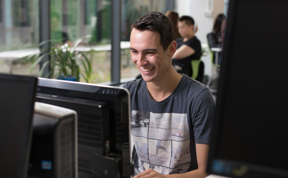 Student sitting at a computer