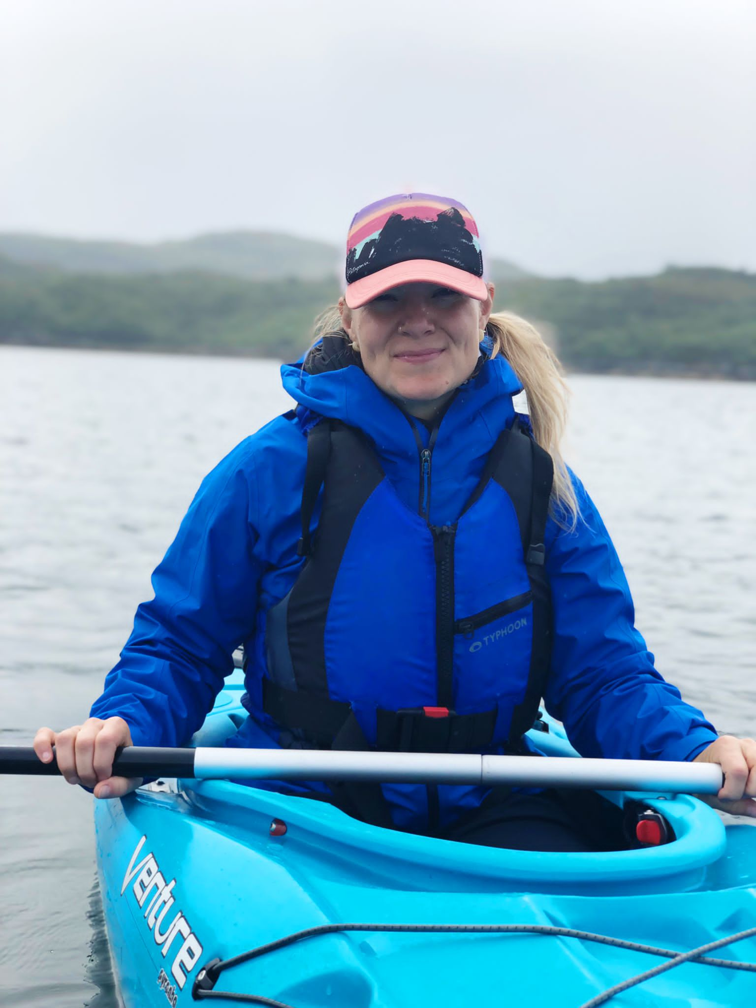 Sandra in a canoe on water