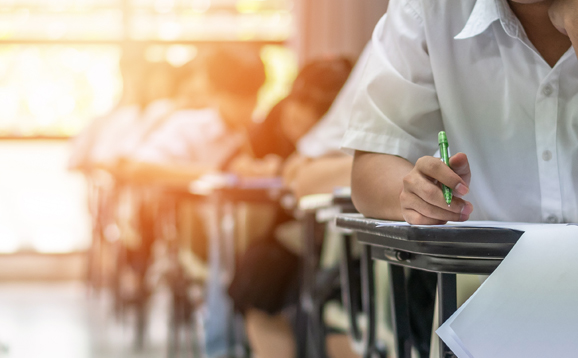 Student concentrating on exam