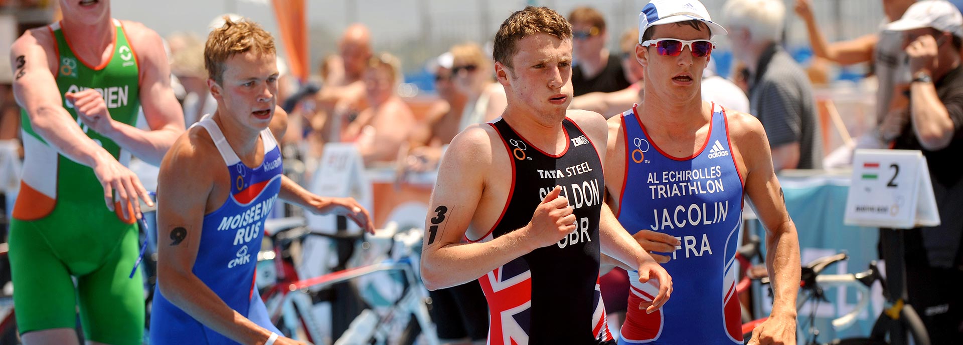 Men racing in international triathlon race