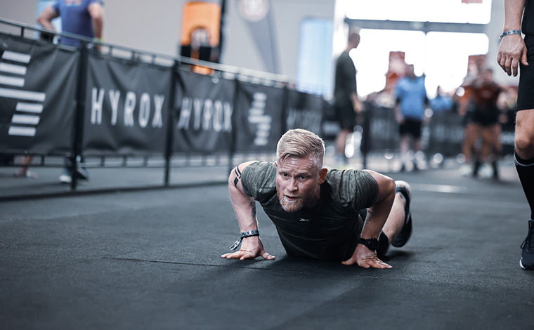 Man doing burpee at Hyrox